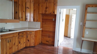 The country kitchen with custom wood cabinets, has