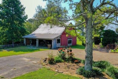 3 story barn with garage doors for easy access