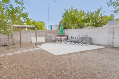 Fenced backyard featuring a patio area