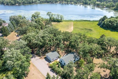 A paved private road comes right to your garage...and then just a few steps into the house.
