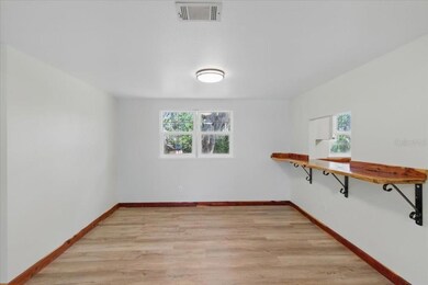 Looking from front door into living room/dining room