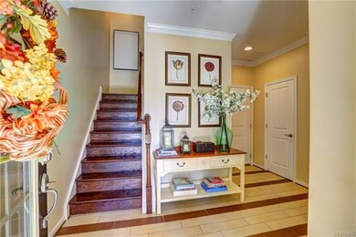 Entry foyer with custom tile.  1st floor bed and f