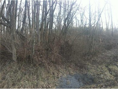 Exterior Front. Wooded Lot