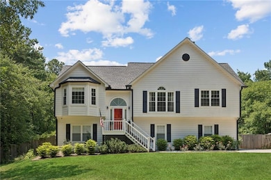 Bi-level home with roof with shingles