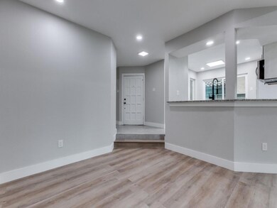 Unfurnished room with light wood-type flooring
