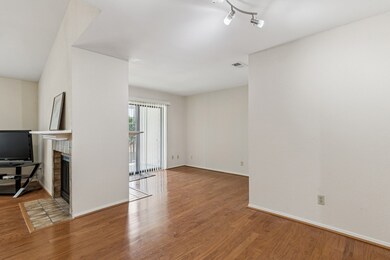 View from dining or office area into 2 living areas