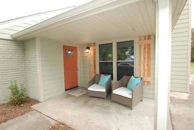 Adorable covered front porch.