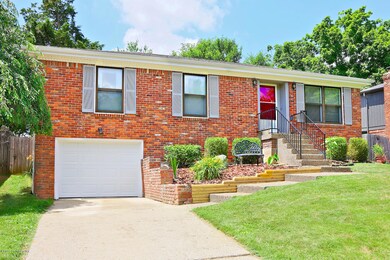 Front of the home w/ attached garage