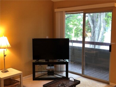 Living Room and Slider Access to Balcony