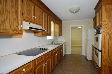 Large kitchen with new cooktop