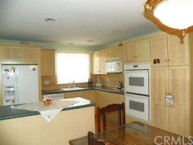 Kitchen features spacious counter tops and double 