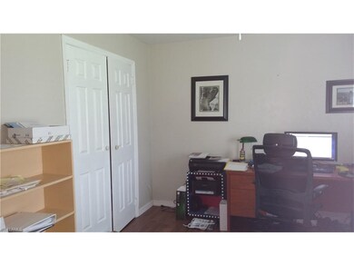 Rear Bedroom (used as office) has two walk in clos