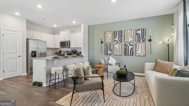 Pearson townhome living room open to the kitchen area