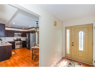 Open foyer flows into kitchen