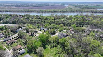 Aerial view featuring a residential view, a water view, and a forest view