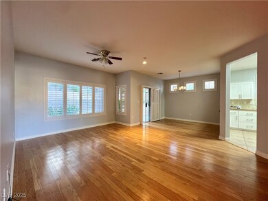 Empty room featuring a chandelier, light wood-type