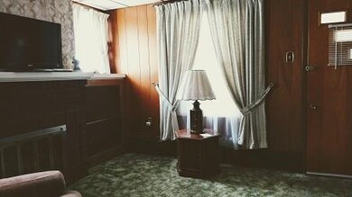 Another view of the Living Room.  Window treatment