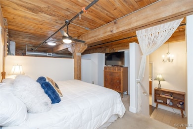 Loft bedroom, pictured with king size bed. The cha
