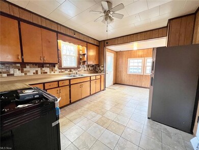 HUGE EAT IN KITCHEN WITH PLENTY OF CABINETS AND CO