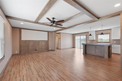 Unfurnished living room with recessed lighting, l