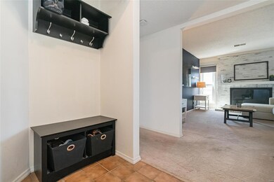 Entry foyer with ceramic tile flooring