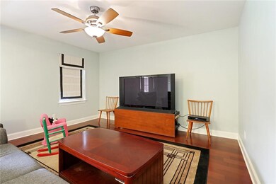 Freshly painted and welcoming, the living room is
