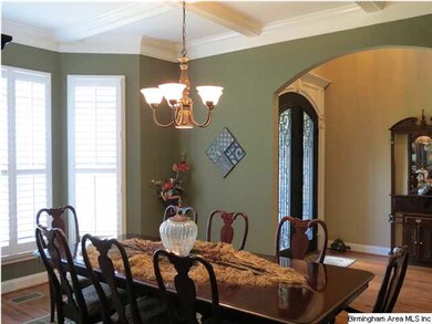 Gorgeous Dining Room with lovely trim and ceiling