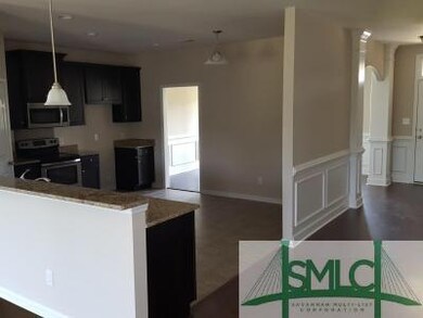 Kitchen with granite counter tops and stainless st