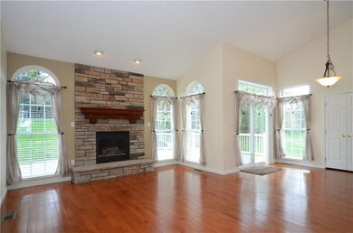 Great room with gas fireplace...hardwood floors