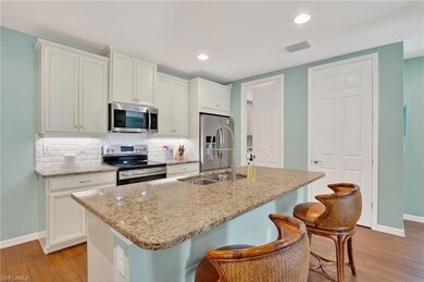 14891 Edgewater Cir, Naples, FL 34114 - photo 7