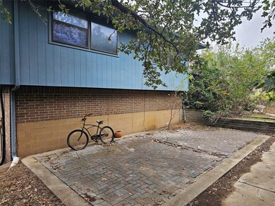 View of side of property featuring a patio
