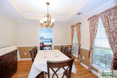 Dining room right off the kitchen for ease in ente