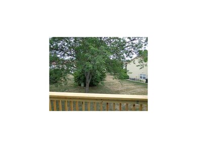 Exterior Back. View of mature trees and green spac