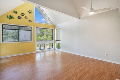 Empty room featuring light wood-type flooring, hig