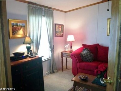 French doors open to den, tv room or home office!
