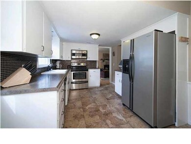 Updated floors, countertops, and stainless steel a