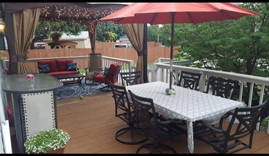 Rear deck perfect for relaxing or entertaining