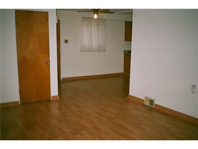 Living Room. LIVING ROOM AREA LEADING TO KITCHEN. 