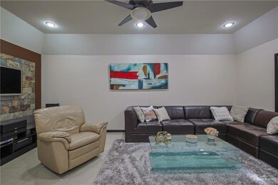 Living room featuring light tile patterned floors