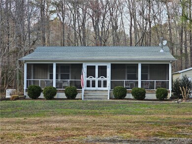 View of front of property with a shingled roof, a