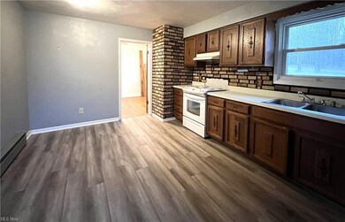Kitchen features brand new luxury vinyl tile floor