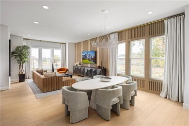 Dining area with light wood-type flooring