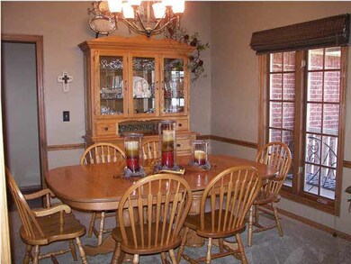 The Formal Dining Rm. has ample room for a large t