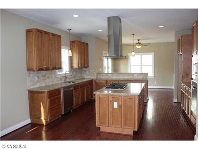 Kitchen - Large Kitchen with Stainless Steel Chimn