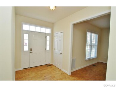 The foyer, quiet cork flooring thru-out the 1st fl