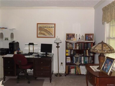 Front Living Room with crown molding makes a quiet