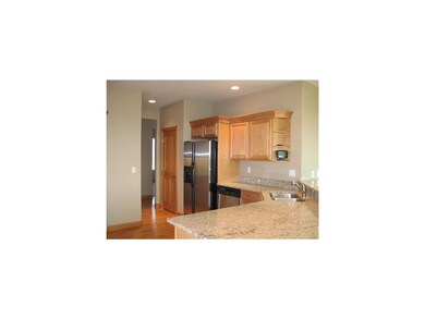 Kitchen. MAPLE CABINETRY WITH CROWN MOLDING