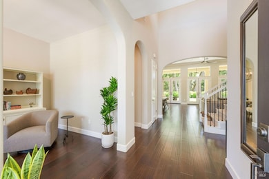 Entry with view of the office and into the living space