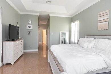 The master bedroom is on the 1st floor of the home