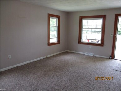 Living room is bright & airy!
